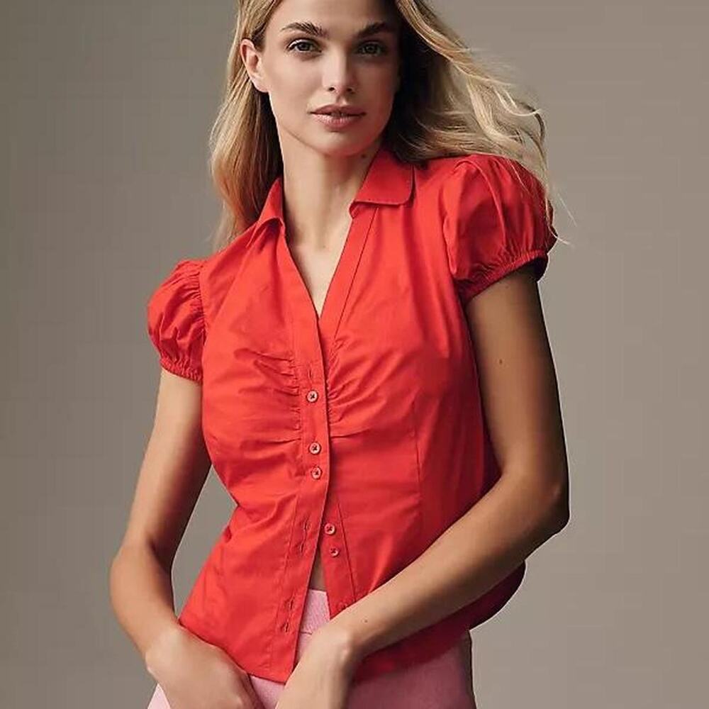 Red button up blouse with